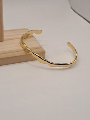 Βραχίολι Χειροπέδα Κυματιστή Από Ανοξείδωτο Ατσάλι Σε Χρυσό